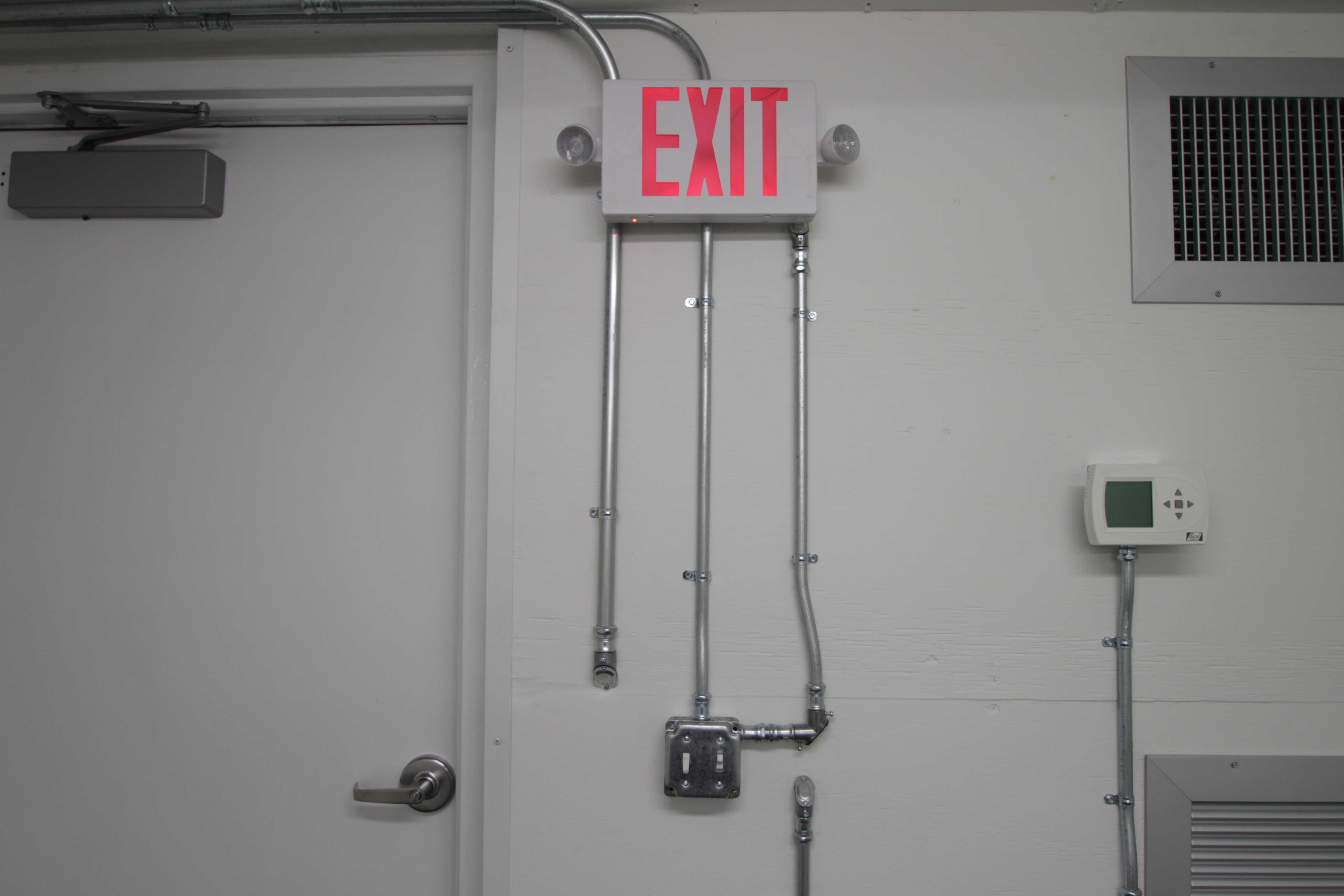 Blast resistant module exit sign