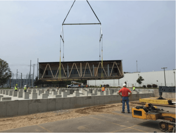 A modular building being assembled at the construction site