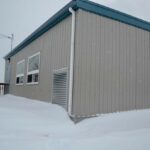 Modular building covered in snow.