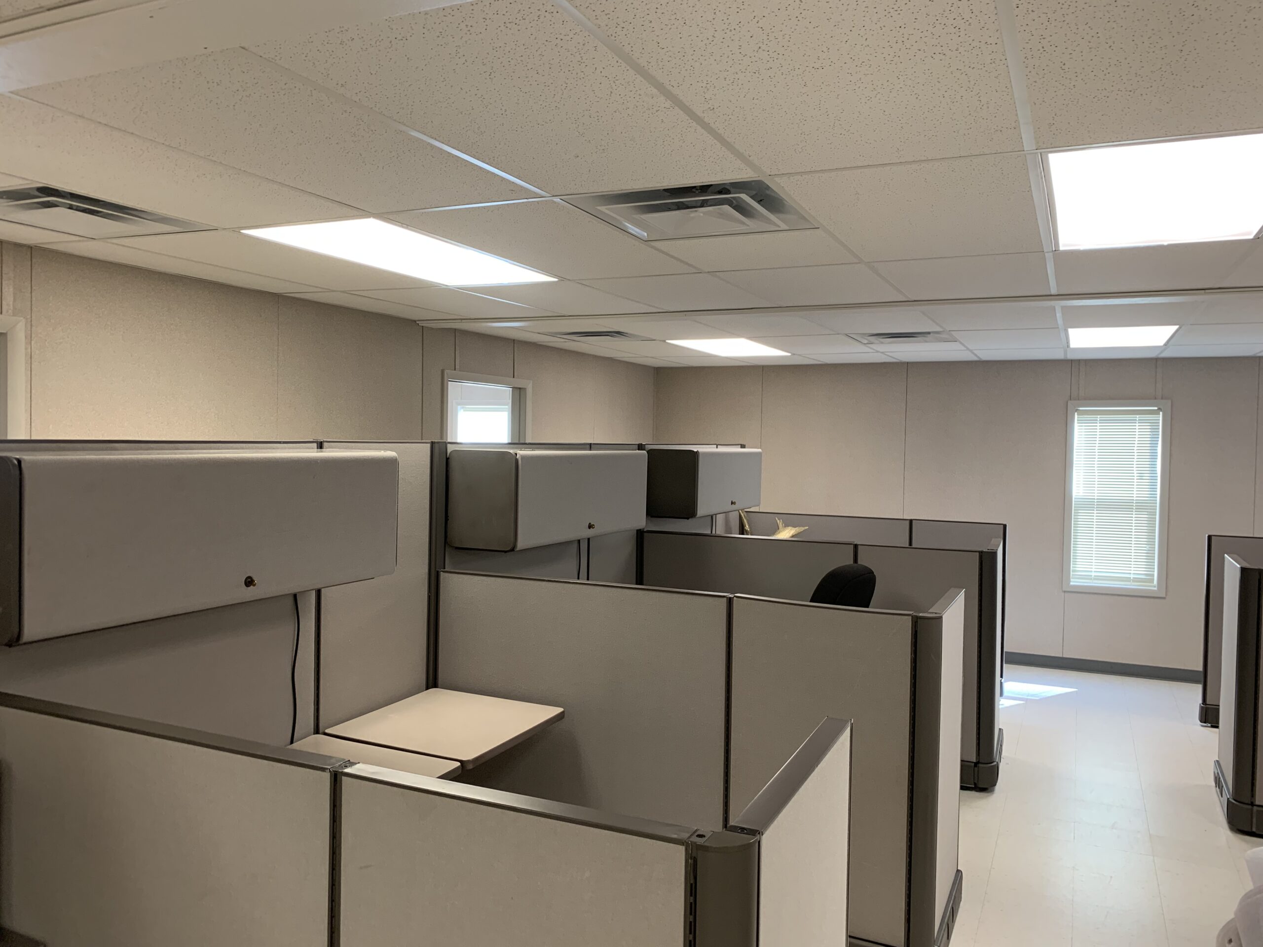 Interior of modular office spaces and work cubicles in the S-Plex Modular Swing Space Project.