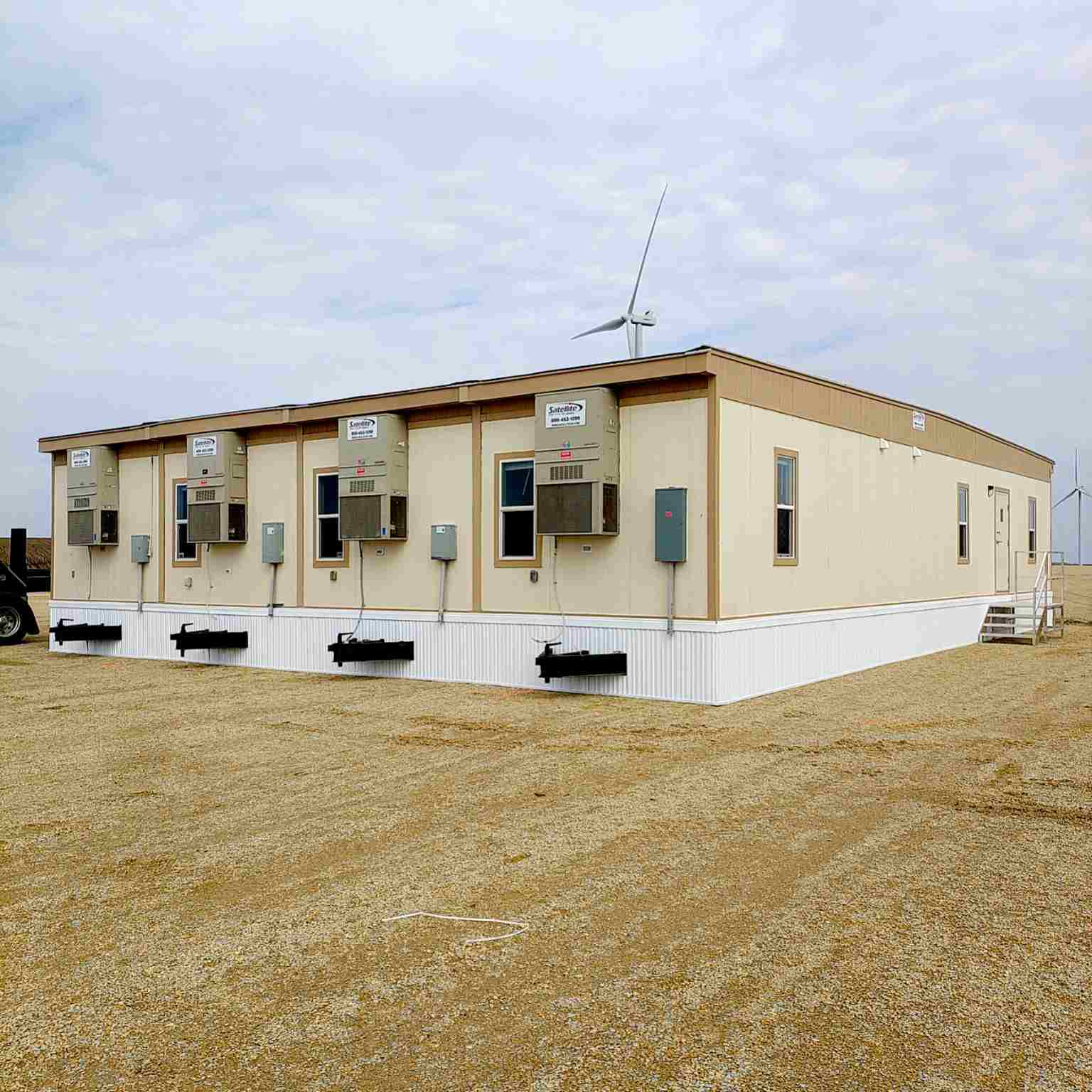 A mobile office w/ skirting.